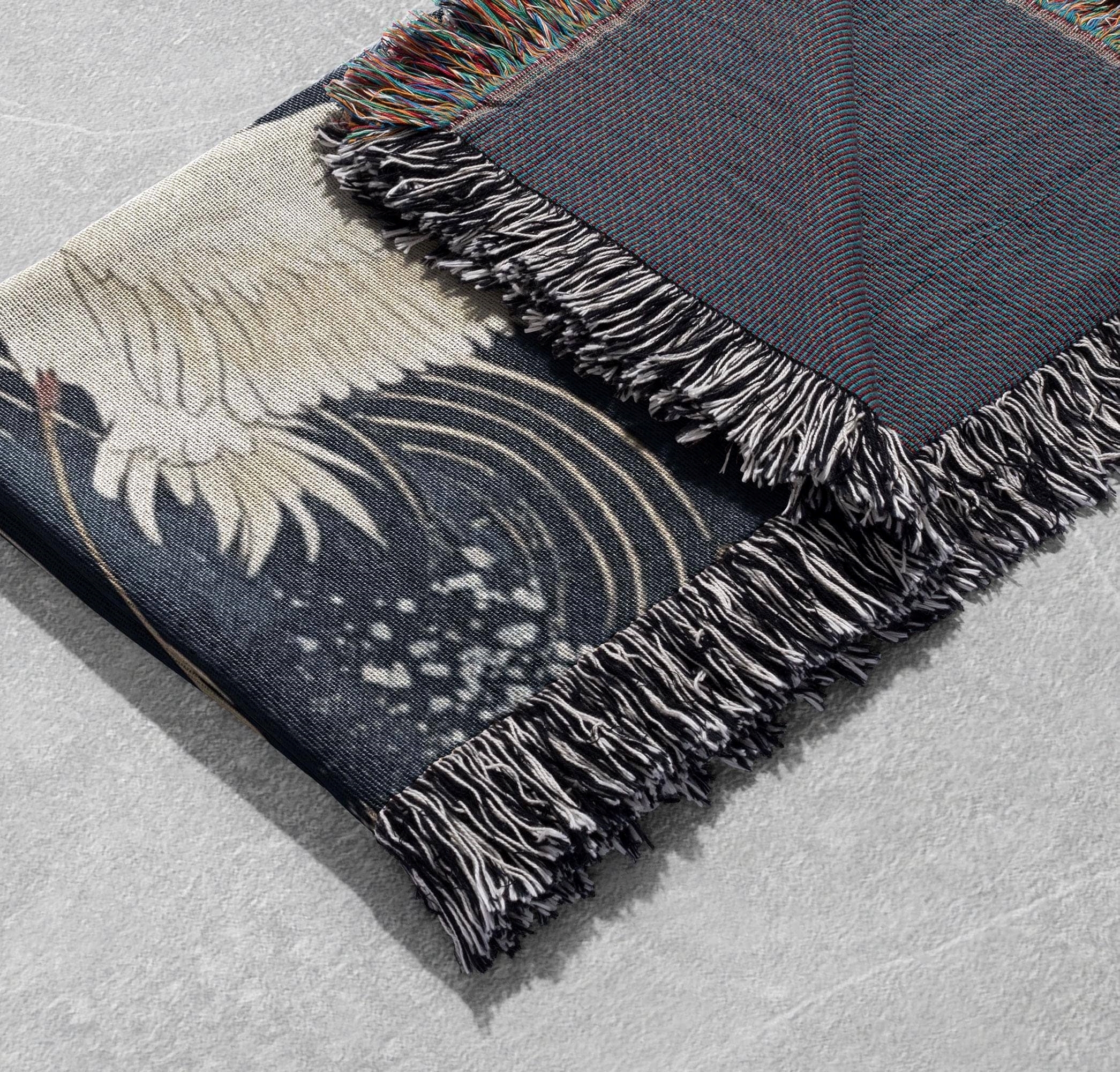 crane and cloud woven blanket with floral design and blue background cottagecore tapestry
