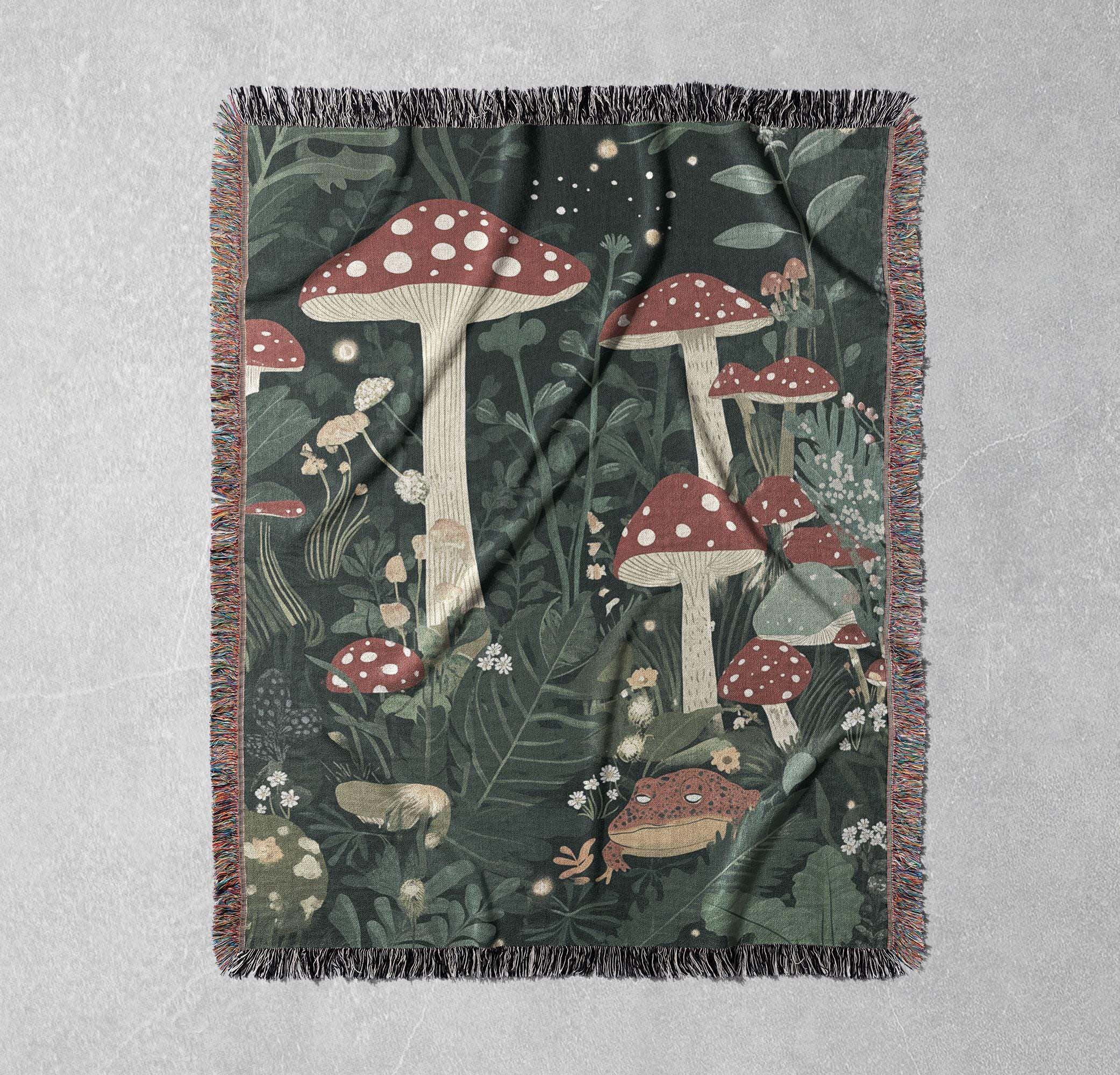 whimsical mushroom forest woven blanket enchanted woodland scene with frog and fireflies for cozy home decor cottagecore