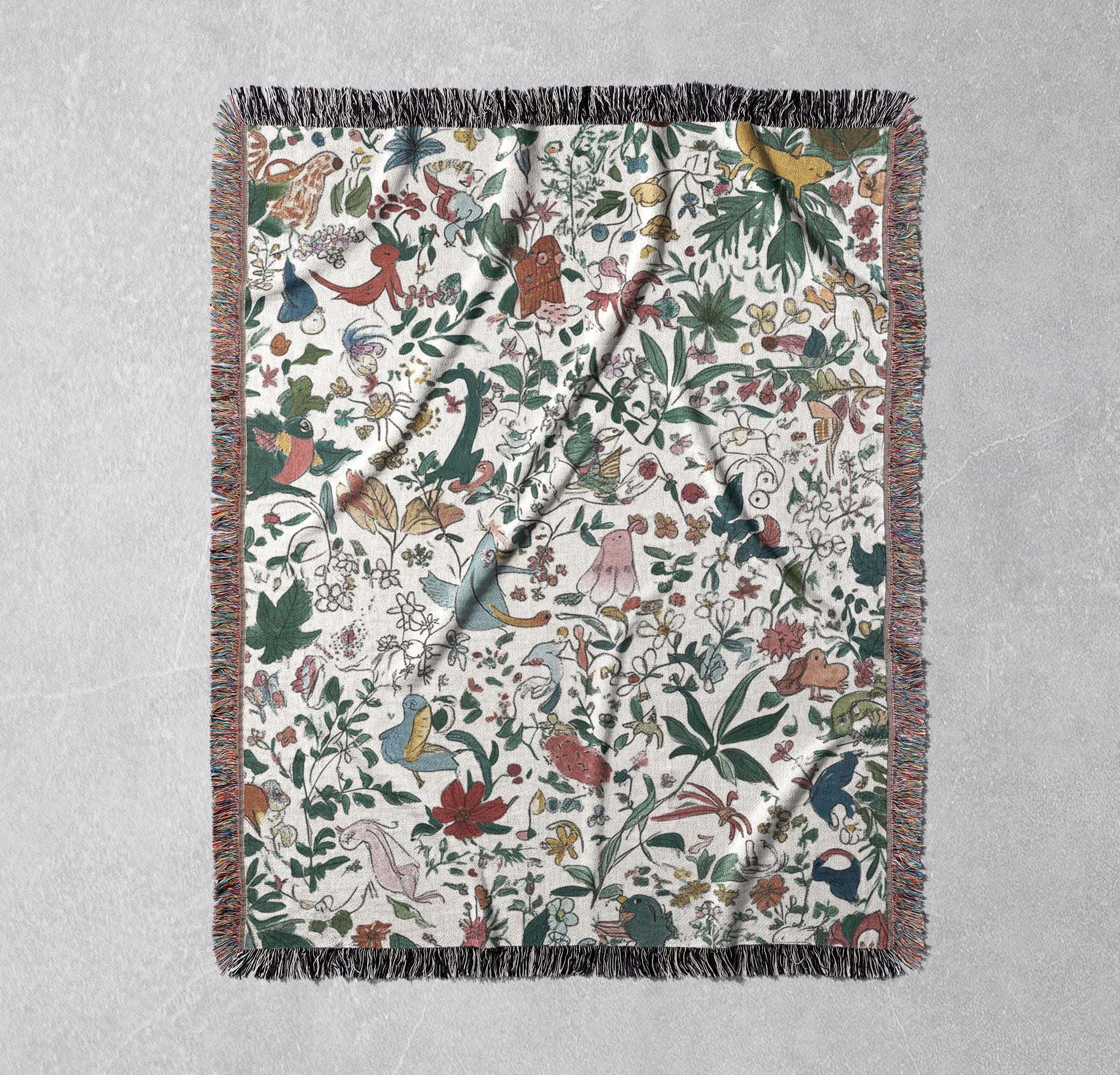 whimsical nature woven blanket with colorful flora and fauna design cozy decorative throw for home and nature lovers tapestry
