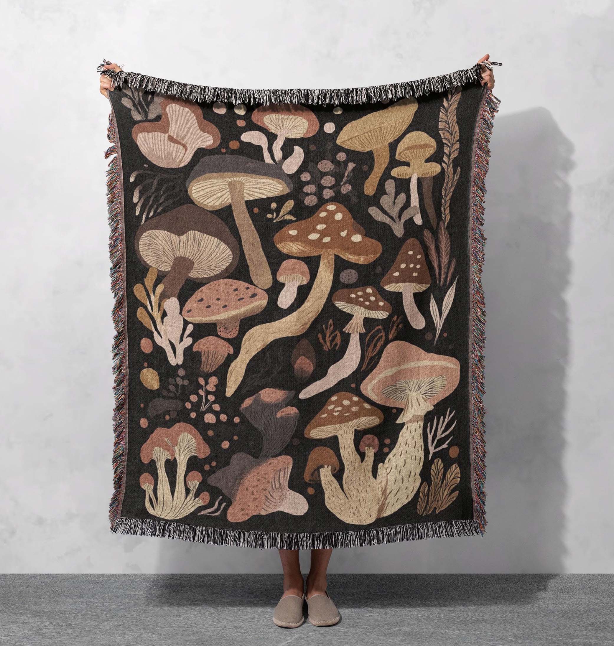 mushroom woven blanket earthy tones fungi design with fringe edges cottagecore tapestry