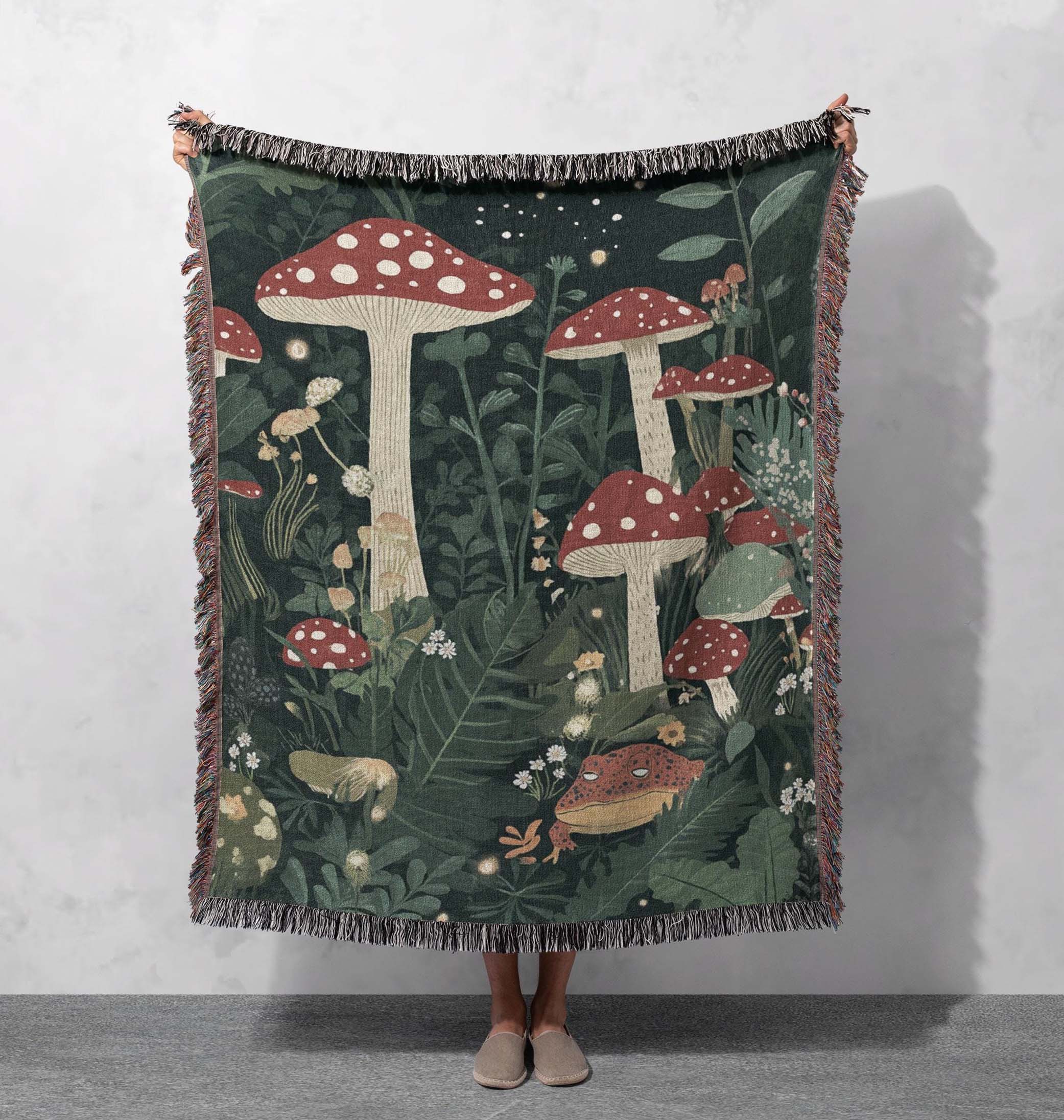 whimsical mushroom forest woven blanket enchanted woodland scene with frog and fireflies for cozy home decor cottagecore